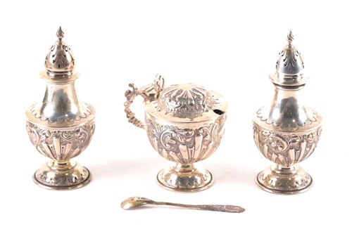 Lot 483 - A late Victorian three-piece silver cruet set,...