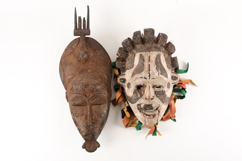 Lot 184 - A Senufo Kpelie mask, Ivory Coast, the tall...
