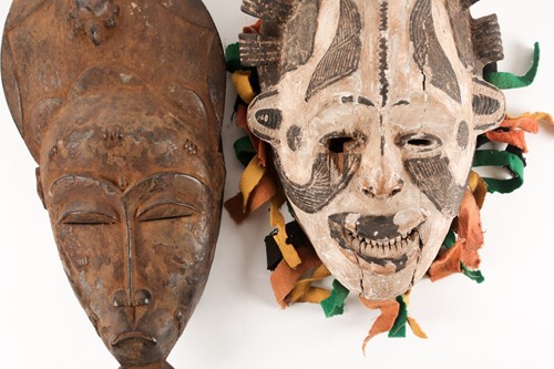 Lot 184 - A Senufo Kpelie mask, Ivory Coast, the tall...