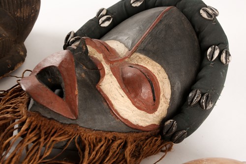 Lot 187 - A Tsogo mask, Gabon, the sectioned face...