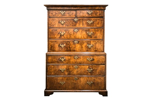 Lot 284 - A George I figured walnut chest on chest...