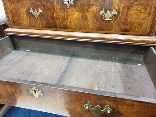 Lot 284 - A George I figured walnut chest on chest...