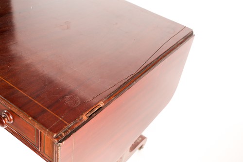 Lot 288 - A Regency brass inlaid mahogany two flap sofa...