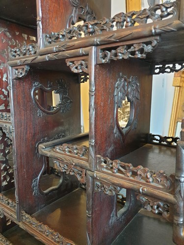 Lot 126 - A Chinese hongmu open cabinet, early 20th...