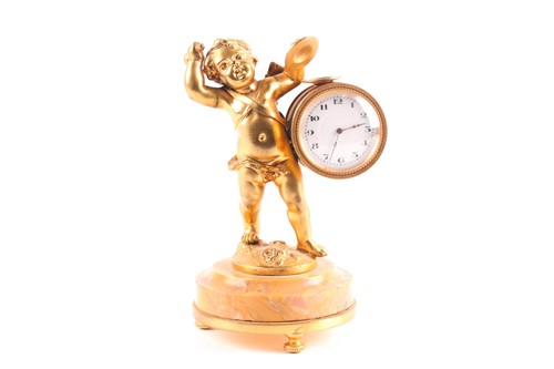 Lot 406 - A late 19th century gilt bronze boudoir clock,...