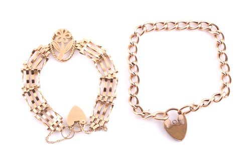 Lot 246 - A 9ct yellow gold gate-link bracelet set with...