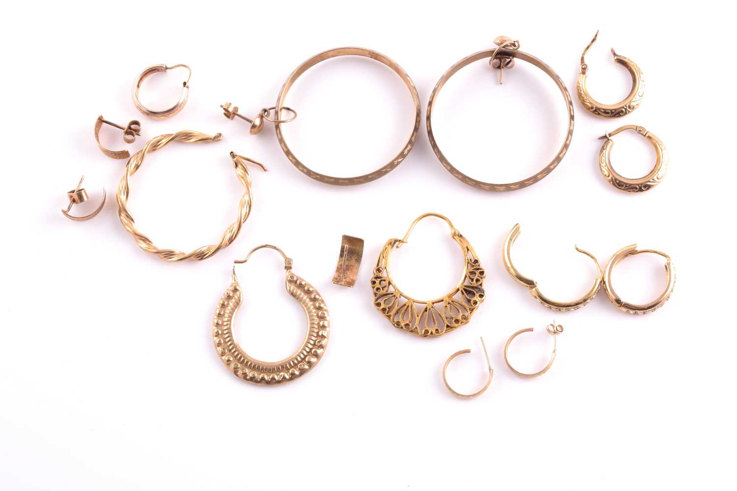Lot 64 - A pair of 9ct yellow gold hoop earrings,...