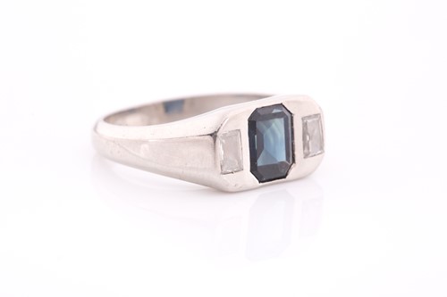 Lot 25 - A diamond and sapphire ring, set with a mixed...