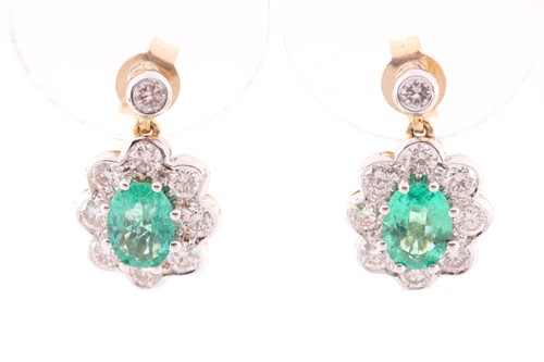 Lot 142 - A pair of diamond and emerald cluster drop...