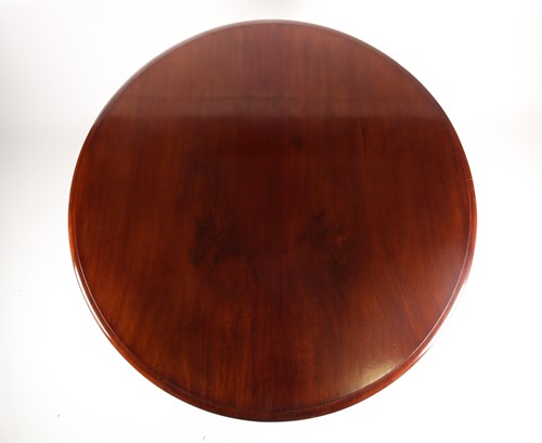 Lot 101 - A Victorian mahogany circular flip-top...
