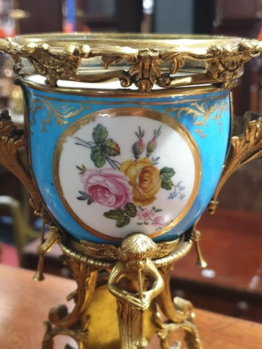 Lot 531 - A 19th century ormolu-mounted Sevres bleu...