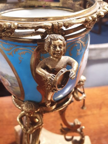 Lot 531 - A 19th century ormolu-mounted Sevres bleu...
