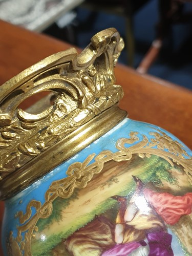 Lot 531 - A 19th century ormolu-mounted Sevres bleu...