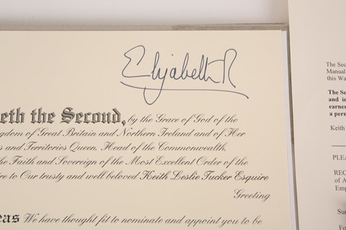 Lot 482 - An M.B.E certificate to Keith Leslie Tucker (M....