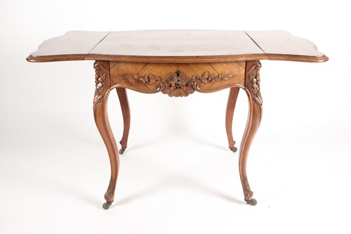Lot 308 - A Louis XV style two flap low rosewood table...