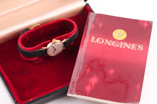 Lot 373 - Longines, a lady’s 9ct gold small round wrist...