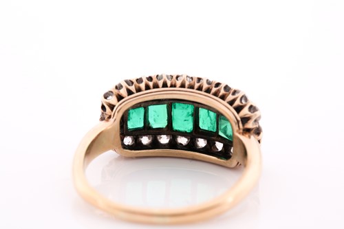Lot 51 - An emerald and diamond three row ring, set...