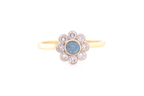 Lot 214 - A diamond and aquamarine cluster ring, the...