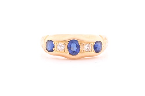 Lot 124 - An 18ct yellow gold, diamond, and synthetic...