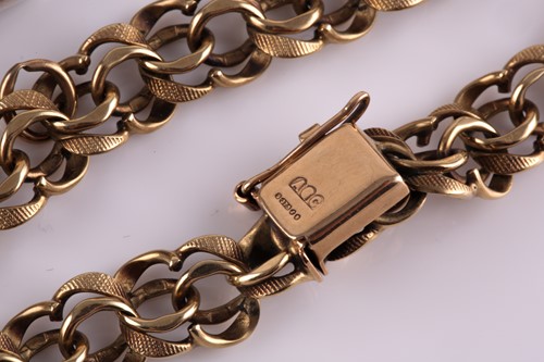 Lot 281 - A 9 carat gold triple hoop bracelet of...
