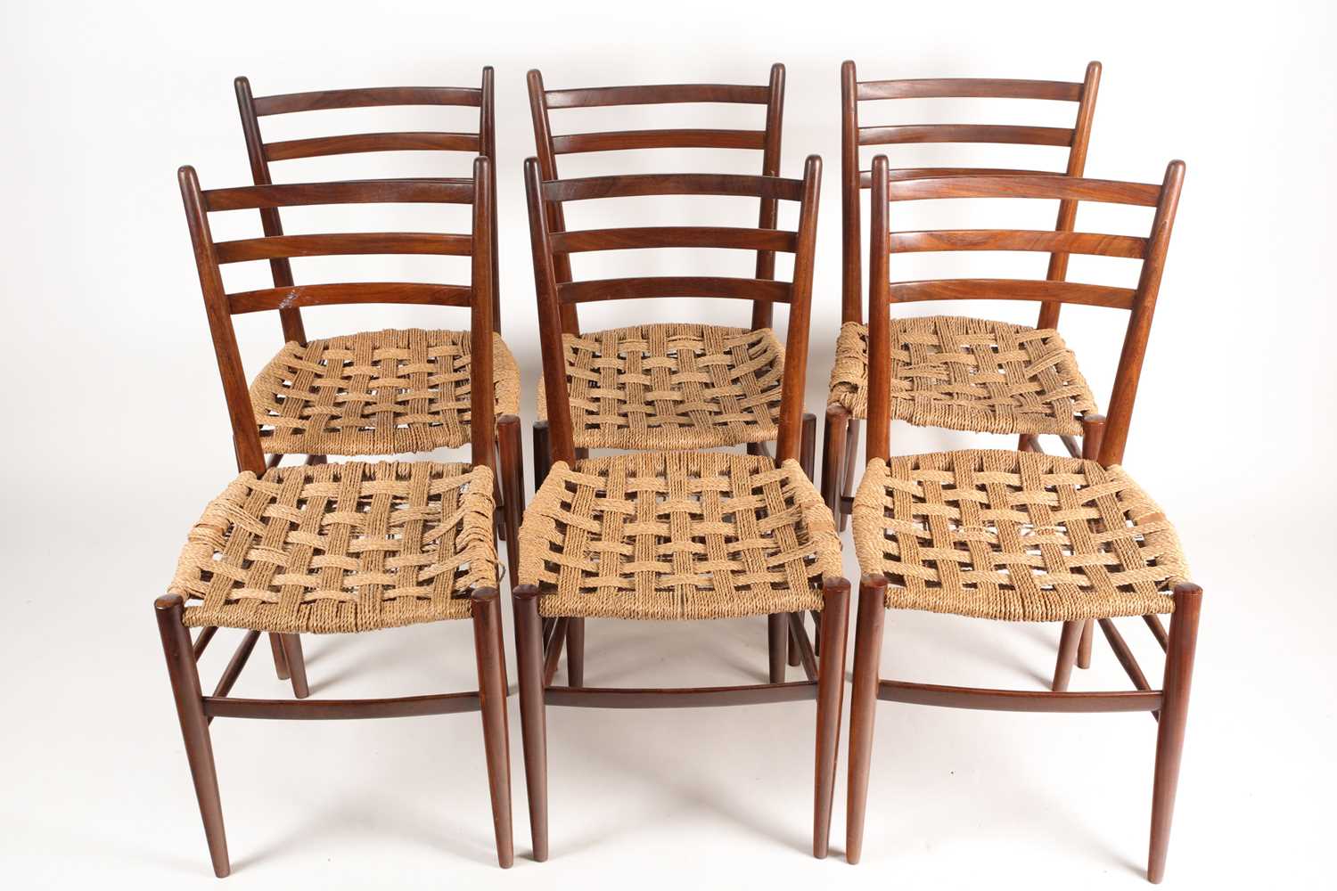 Lot 313 - Otto Gerdau. A set of 1960s teakwood chairs...