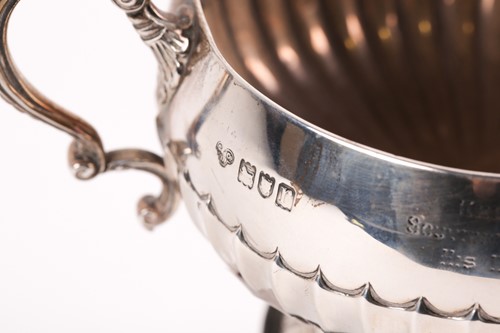 Lot 385 - A small silver trophy cup; London 1912 by The...