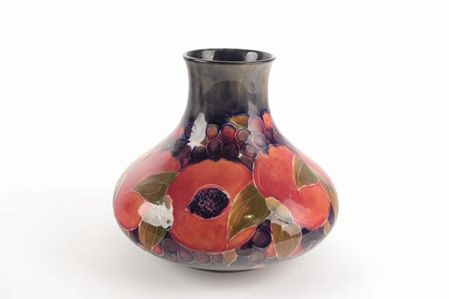 Lot 547 - A William Moorcroft pottery vase, of squat...