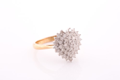 Lot 363 - An 18ct yellow gold and diamond ring, the...