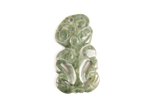 Lot 207 - A Maori carved nephrite Tiki pendant, applied...