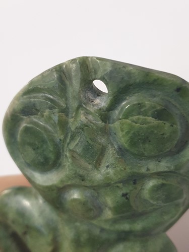 Lot 207 - A Maori carved nephrite Tiki pendant, applied...