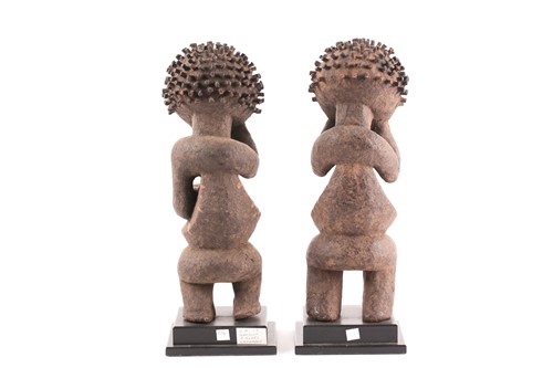 Lot 210 - Mambila standing male and female figures,...