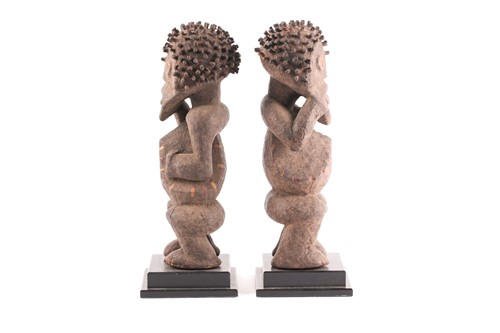 Lot 210 - Mambila standing male and female figures,...