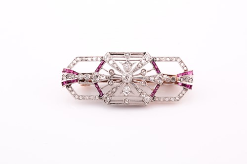 Lot 172 - A diamond and ruby plaque brooch, in the Art...