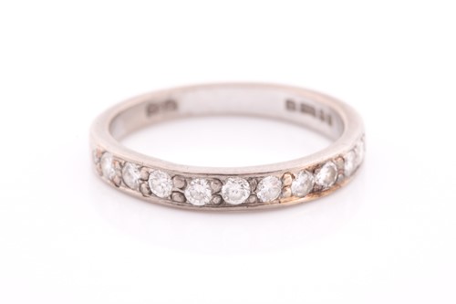 Lot 72 - An 18ct white gold and diamond half eternity...