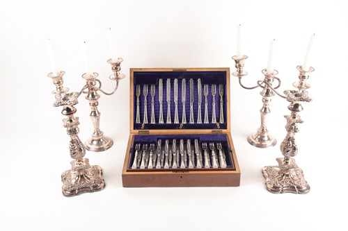 Lot 485 - A canteen of silver plated fish knives & forks...