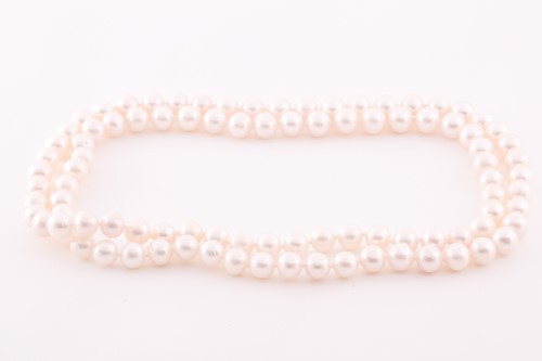 Lot 42 - A cultured pearl necklace, comprised of...
