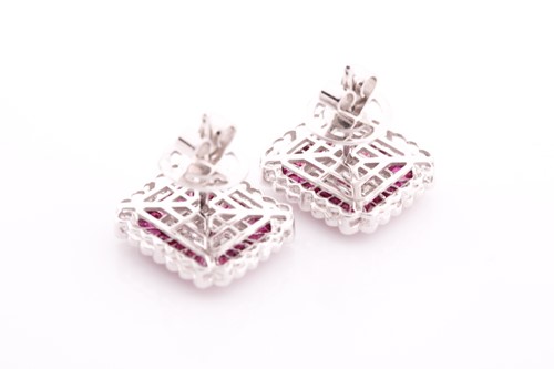 Lot 287 - A pair of diamond and ruby earrings, the...