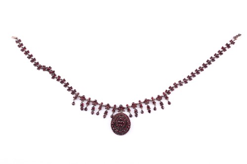 Lot 192 - A 19th century silver gilt and garnet necklace,...
