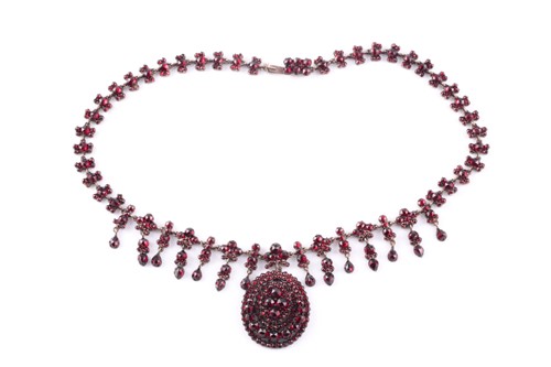 Lot 192 - A 19th century silver gilt and garnet necklace,...