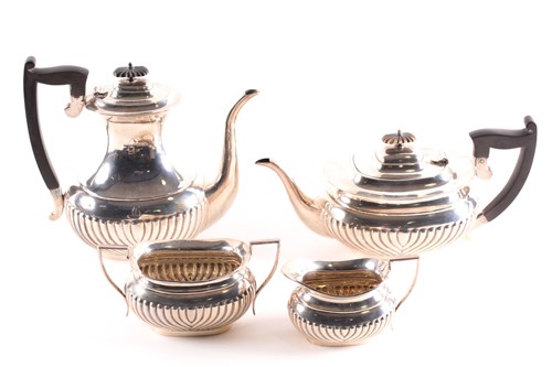 Lot 413 - An Edward VII four-piece silver tea set,...