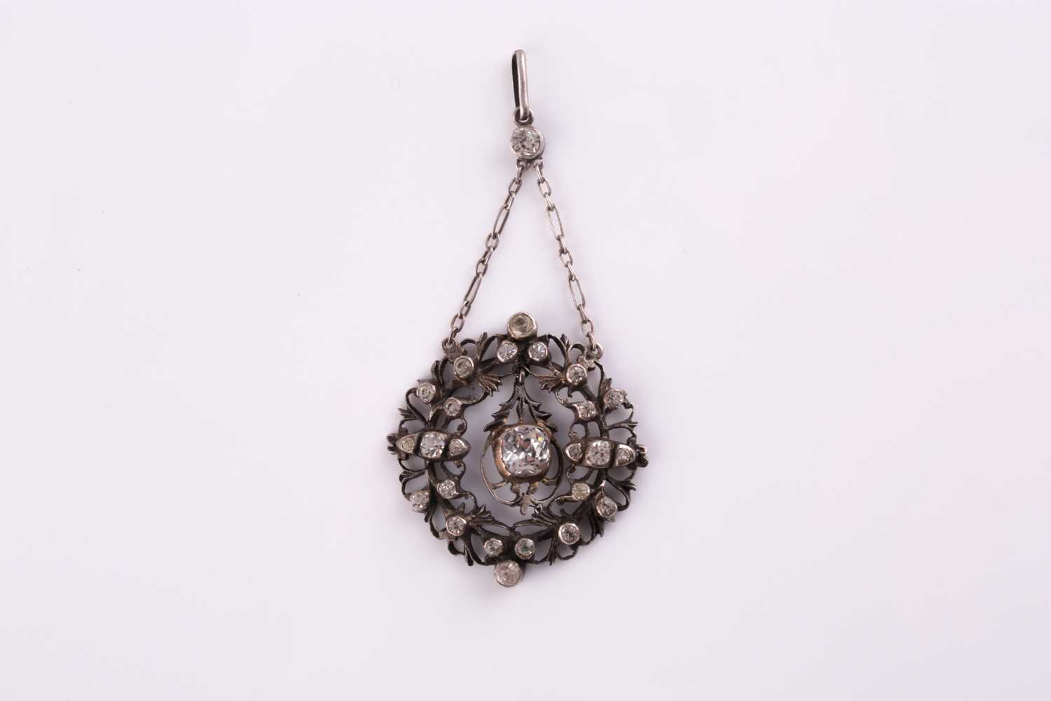 Lot 290 - A 19th century white metal and paste pendant,...