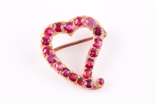 Lot 50 - A yellow metal and red spinel heart-shaped...