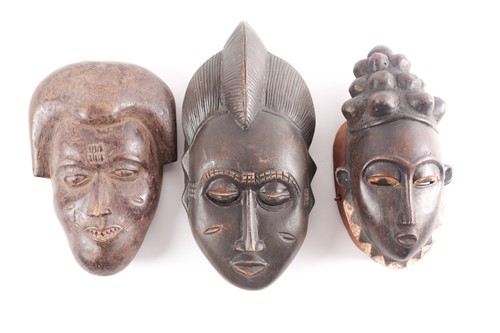 Lot 218 - A pair of Baule female masks, Nigeria, each...