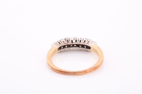 Lot 156 - An 18ct yellow gold and diamond ring, set with...