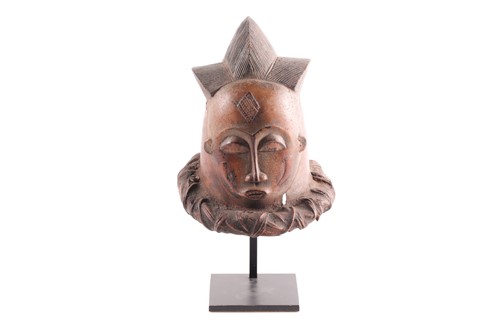 Lot 221 - A small Baule helmet mask, Ivory Coast, the...