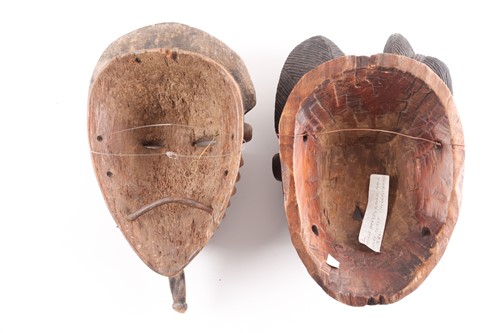 Lot 226 - A Baule Janus mask, Mblo, Ivory Coast, each...
