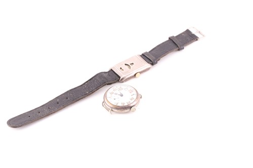 Lot 501 - A silver military style wristwatch, the...
