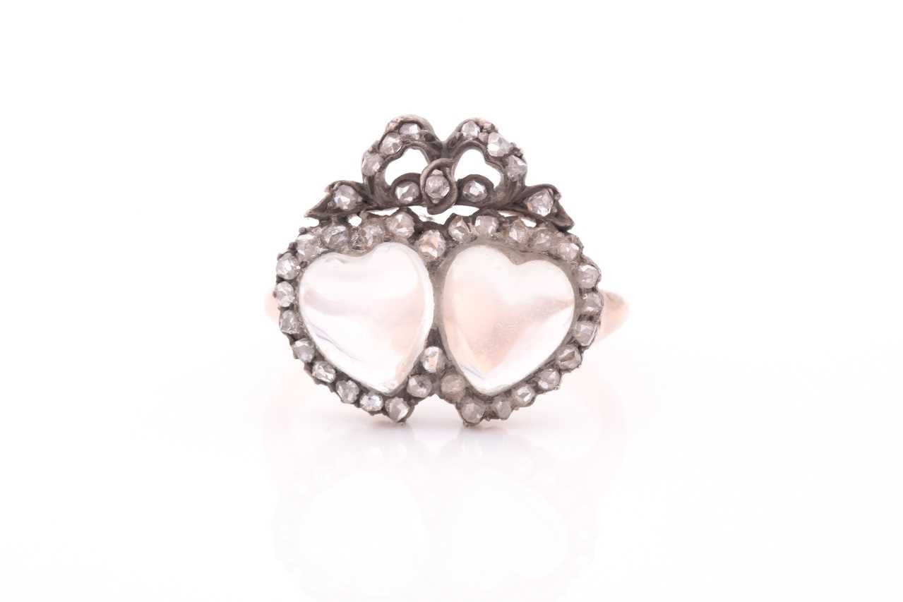 Lot 77 - An antique diamond and moonstone double heart...