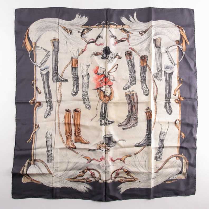 Lot 338 - A Hermes silk square scarf printed with...