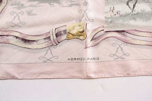Lot 338 - A Hermes silk square scarf printed with...